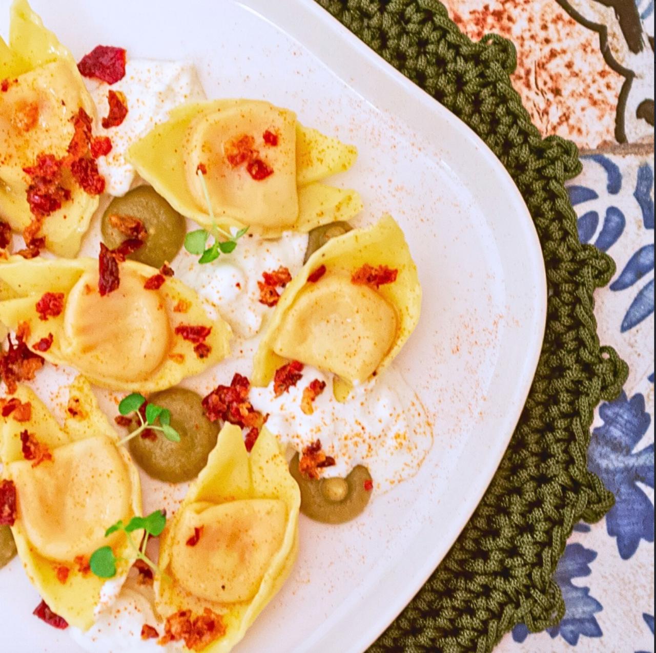 Ravioli con stracciatella e pomodoro secco